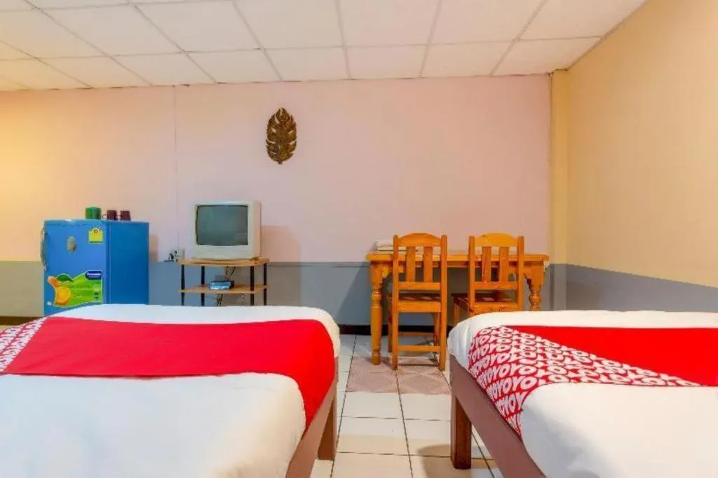 Bed in OYO 1000 Maetang Hotel