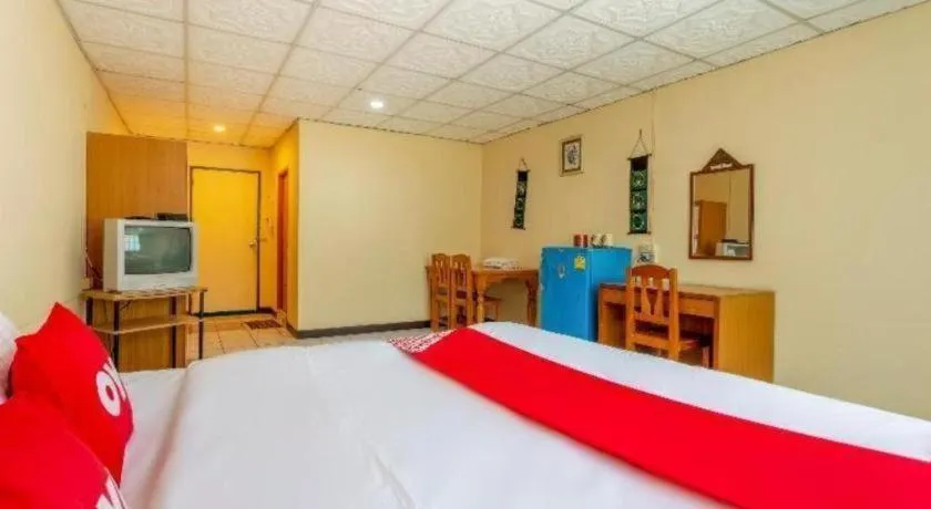 Bed in OYO 1000 Maetang Hotel