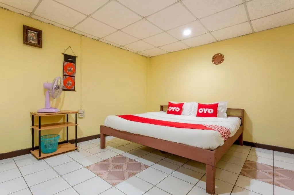 Bed in OYO 1000 Maetang Hotel
