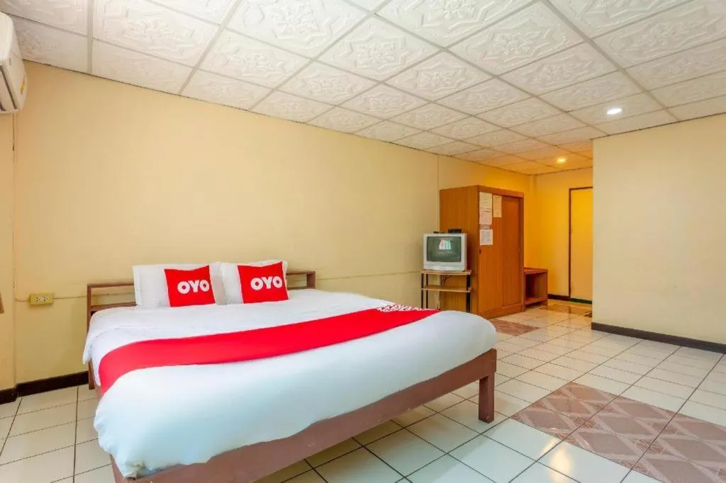 Bed in OYO 1000 Maetang Hotel