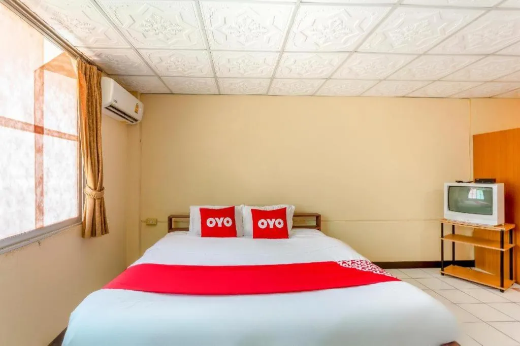 Bed in OYO 1000 Maetang Hotel