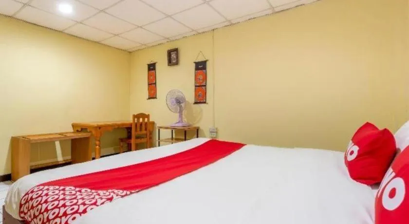 Bed in OYO 1000 Maetang Hotel