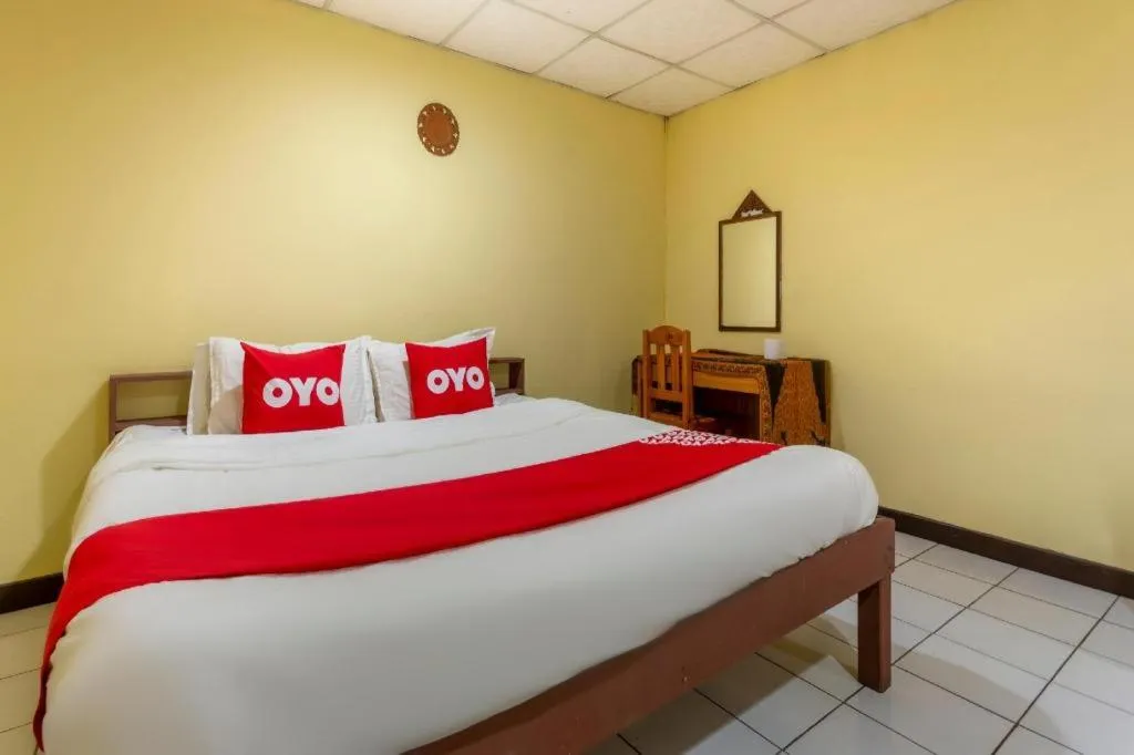 Bed in OYO 1000 Maetang Hotel