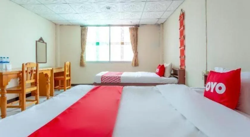 Bed in OYO 1000 Maetang Hotel