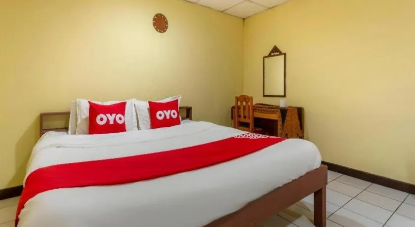 Bed in OYO 1000 Maetang Hotel