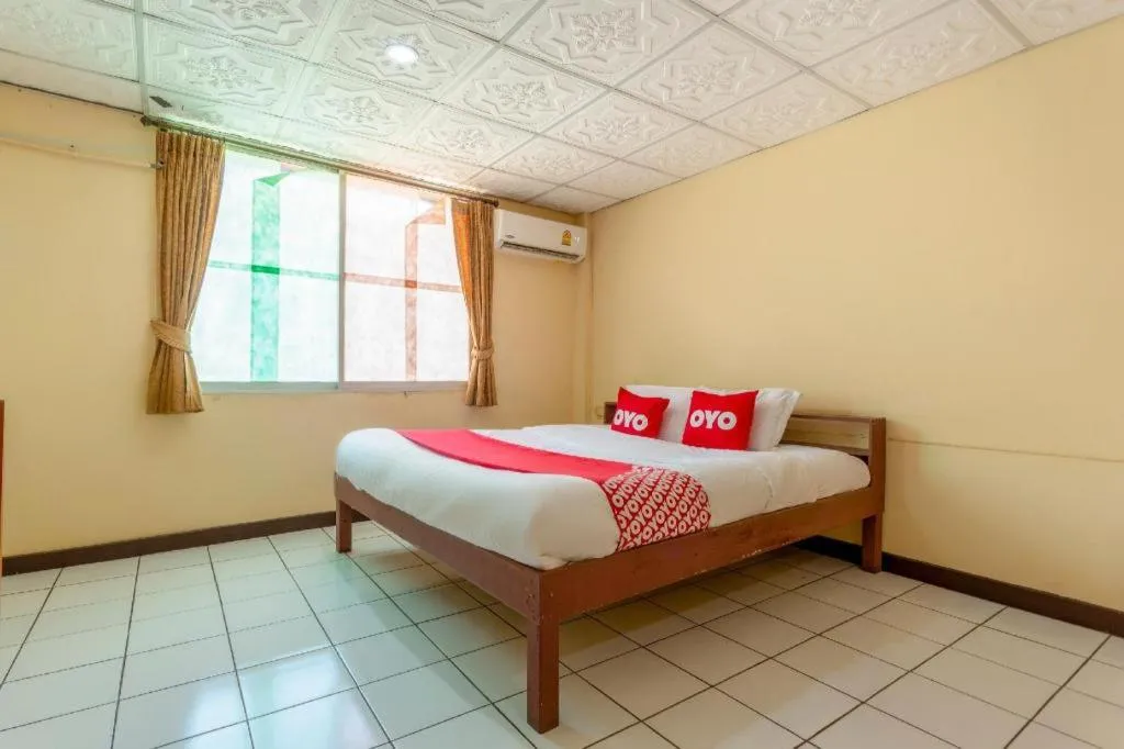 Bed in OYO 1000 Maetang Hotel