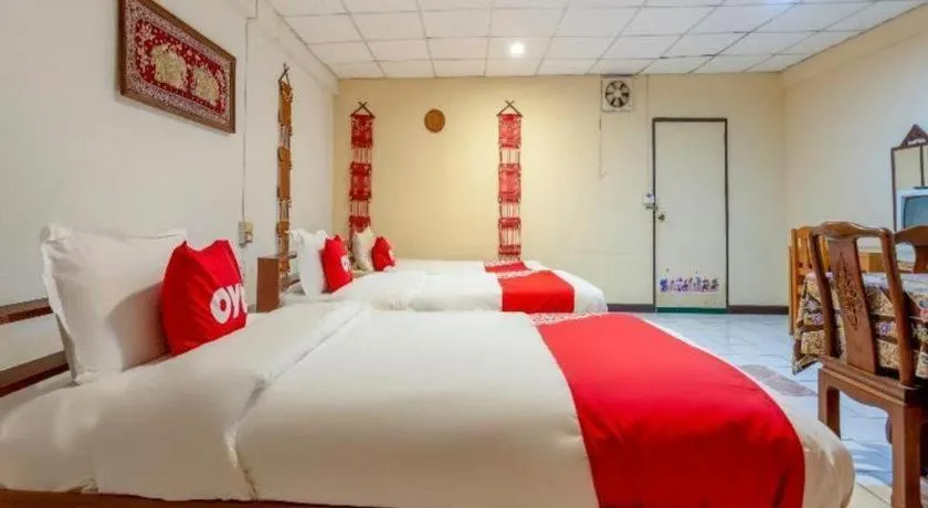 Bed in OYO 1000 Maetang Hotel