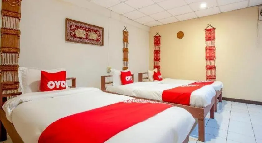 Bed in OYO 1000 Maetang Hotel