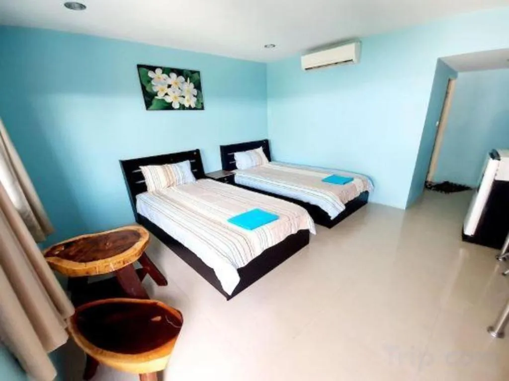 Bed in OYO 981 Fluke and Flame Cha Am