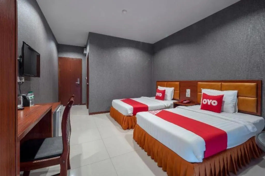 Bed in OYO 1130 CK Resort Pattaya