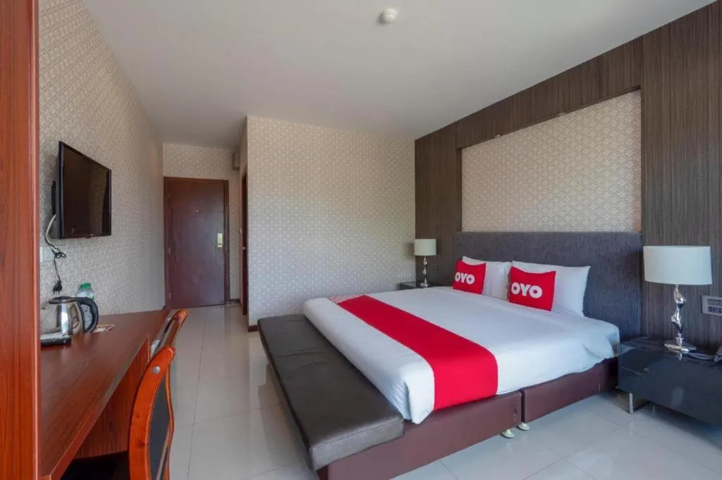 Bed in OYO 1130 CK Resort Pattaya