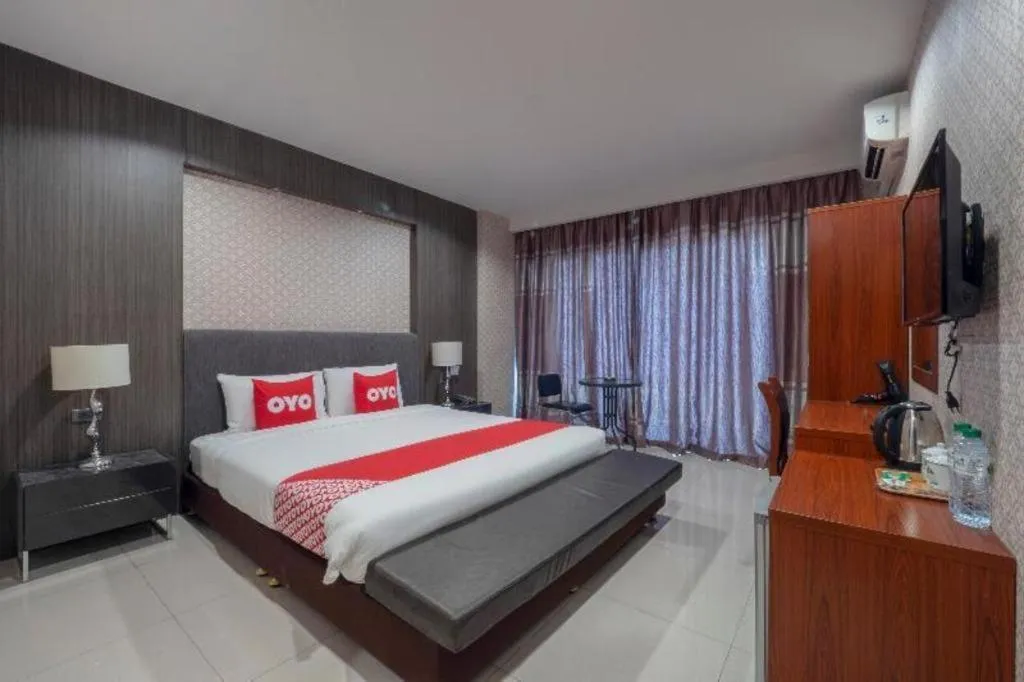 Bed in OYO 1130 CK Resort Pattaya