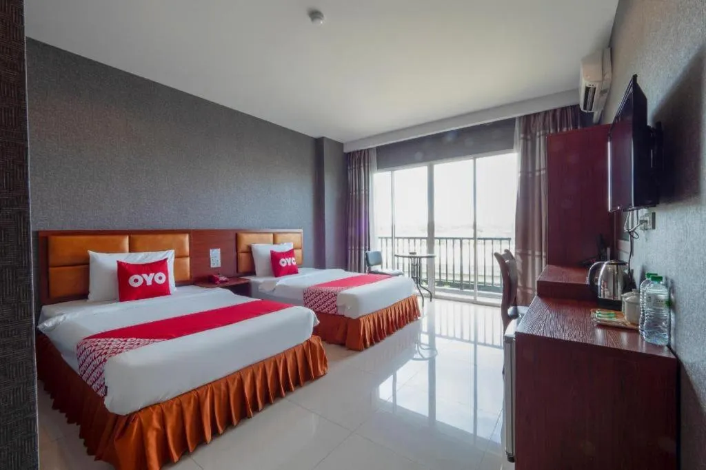 Bed in OYO 1130 CK Resort Pattaya