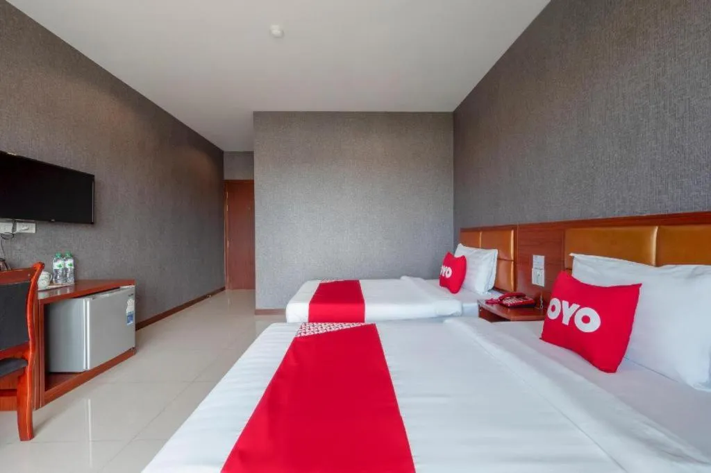 Bed in OYO 1130 CK Resort Pattaya