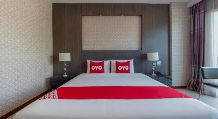 Bed in OYO 1130 CK Resort Pattaya