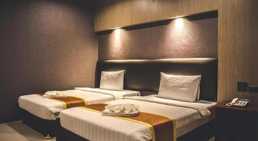 Bed in OYO 1130 CK Resort Pattaya