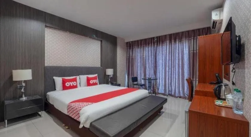 Bed in OYO 1130 CK Resort Pattaya
