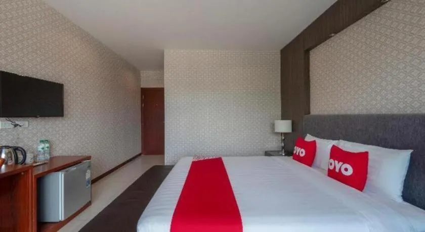 Bed in OYO 1130 CK Resort Pattaya