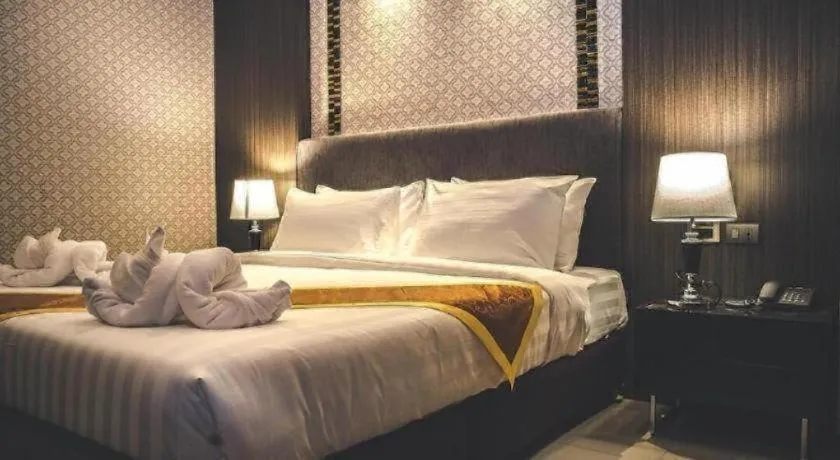 Bed in OYO 1130 CK Resort Pattaya