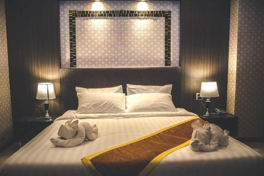 Bed in OYO 1130 CK Resort Pattaya