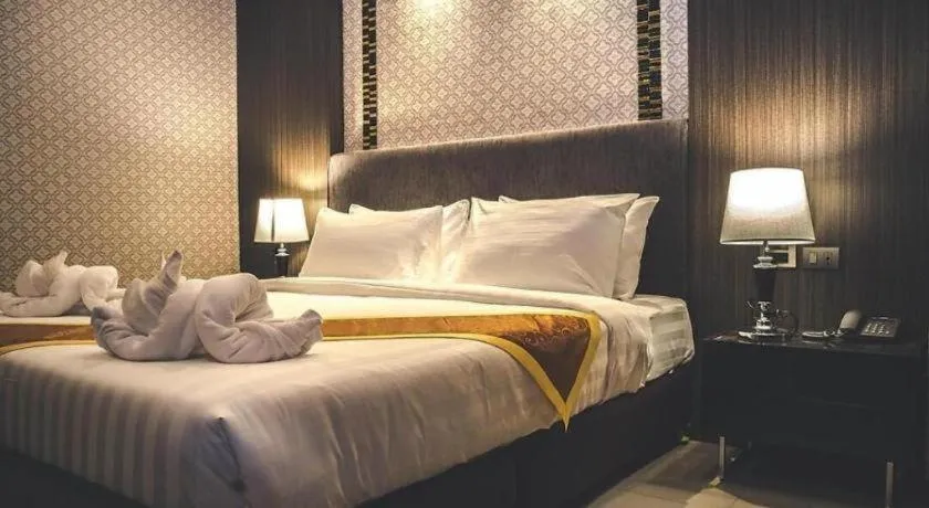 Bed in OYO 1130 CK Resort Pattaya