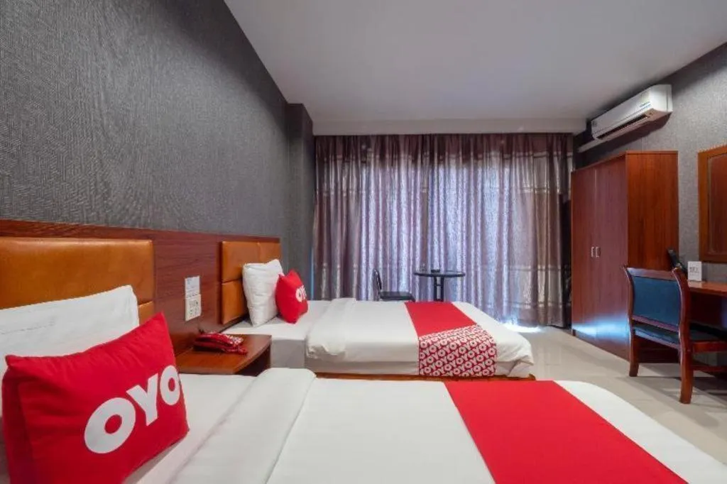 Bed in OYO 1130 CK Resort Pattaya