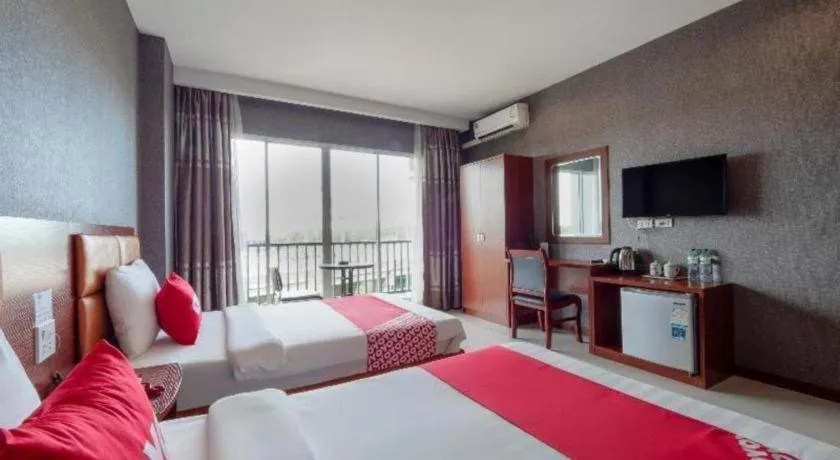 Bed in OYO 1130 CK Resort Pattaya