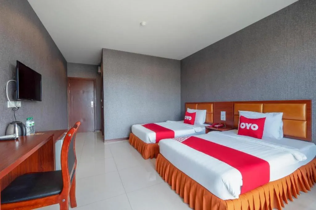Bed in OYO 1130 CK Resort Pattaya