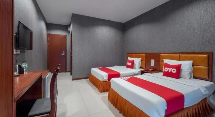 Bed in OYO 1130 CK Resort Pattaya