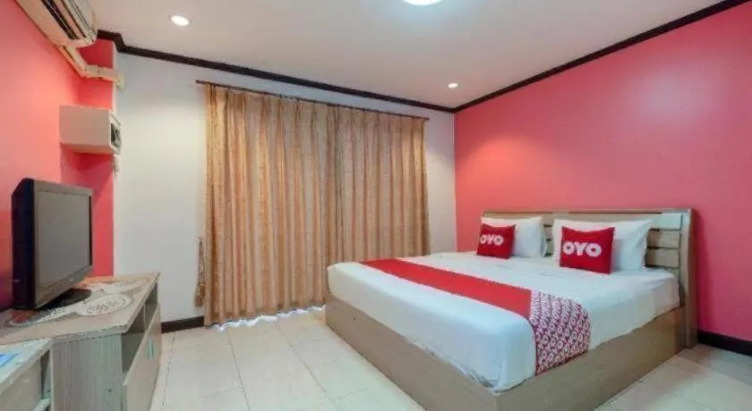 Bed in OYO 75327 Diyana Residence