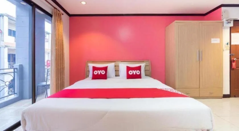 Bed in OYO 75327 Diyana Residence