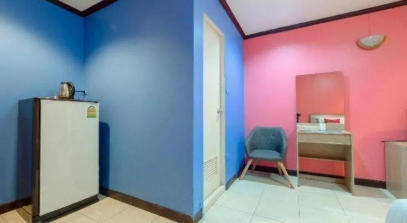 Bed in OYO 75327 Diyana Residence