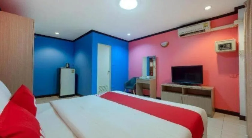 Bed in OYO 75327 Diyana Residence