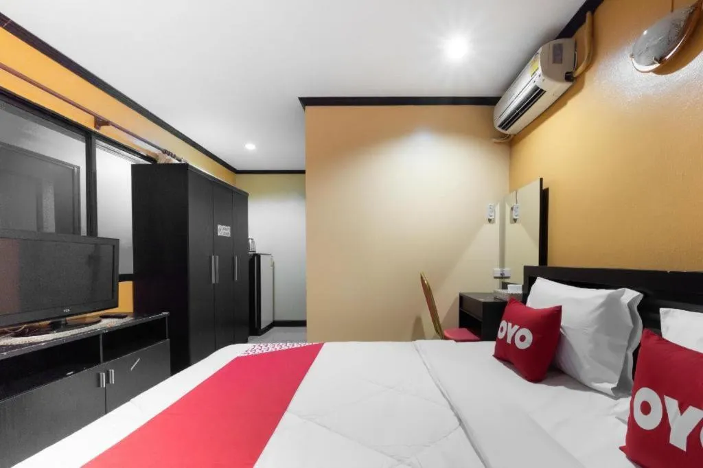 Bed in OYO 75327 Diyana Residence