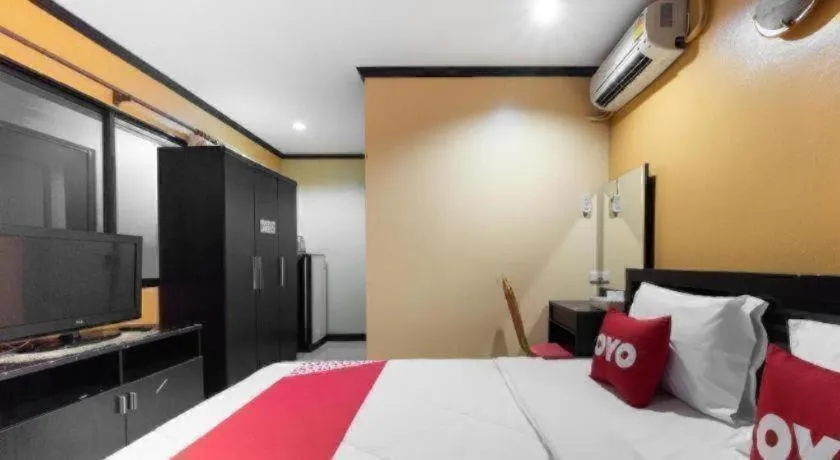 Bed in OYO 75327 Diyana Residence