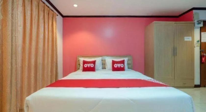 Bed in OYO 75327 Diyana Residence