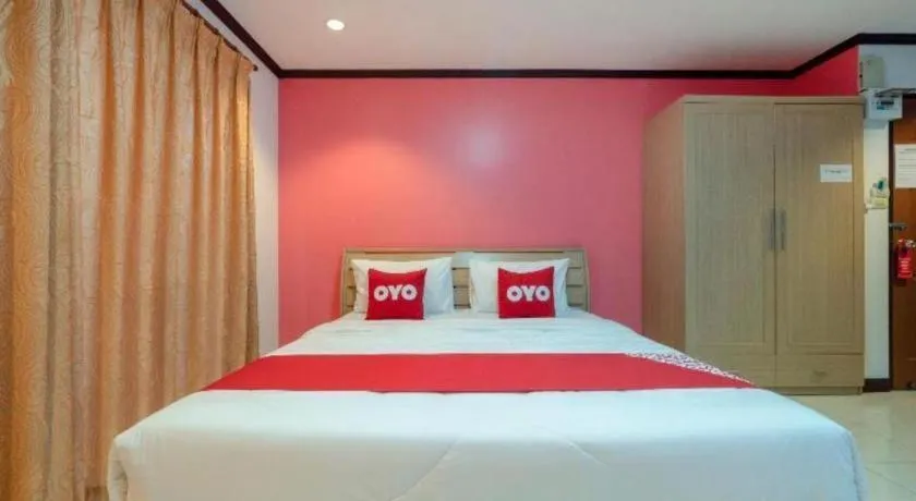 Bed in OYO 75327 Diyana Residence