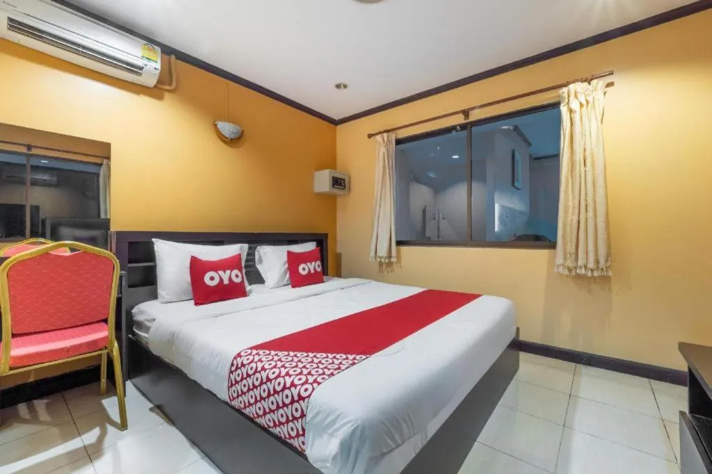 Bed in OYO 75327 Diyana Residence