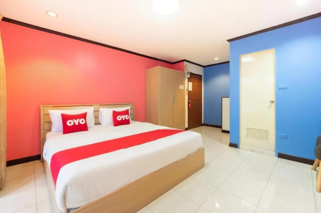 Bed in OYO 75327 Diyana Residence