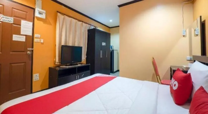 Bed in OYO 75327 Diyana Residence