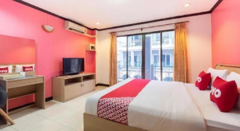 Bed in OYO 75327 Diyana Residence