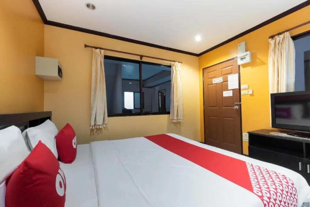 Bed in OYO 75327 Diyana Residence