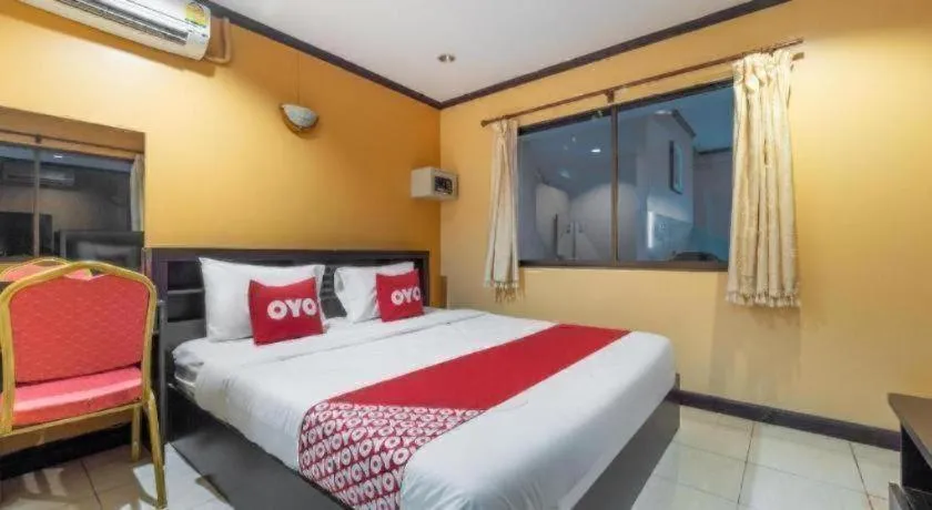 Bed in OYO 75327 Diyana Residence