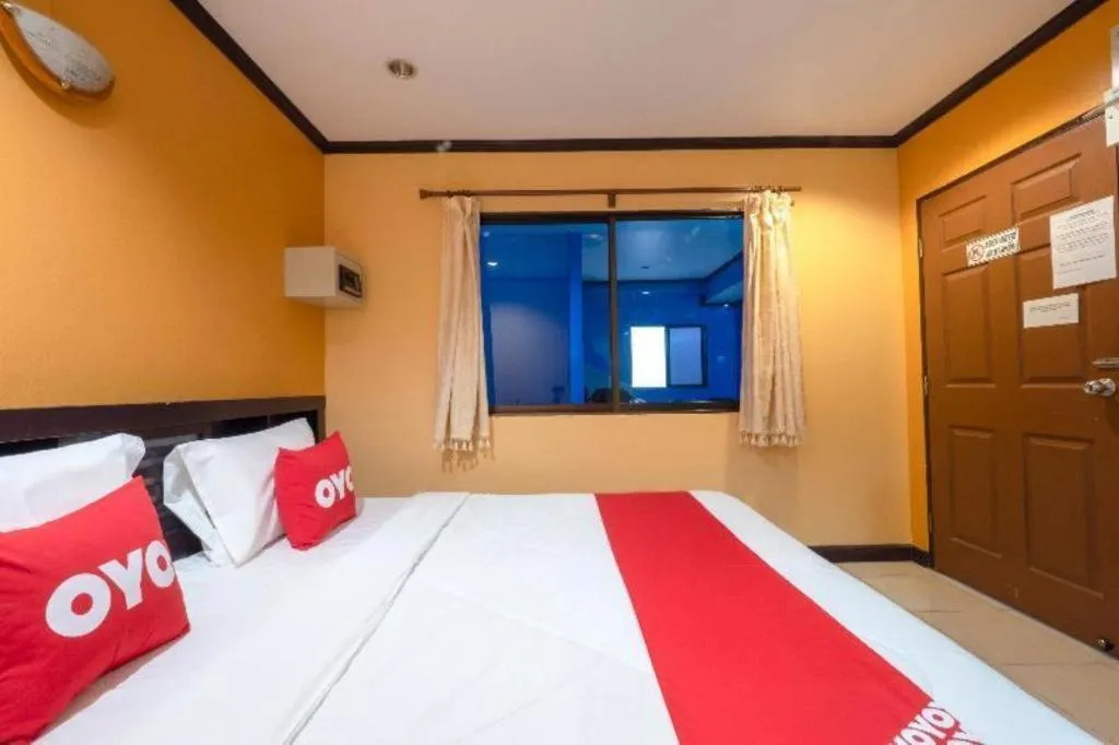 Bed in OYO 75327 Diyana Residence