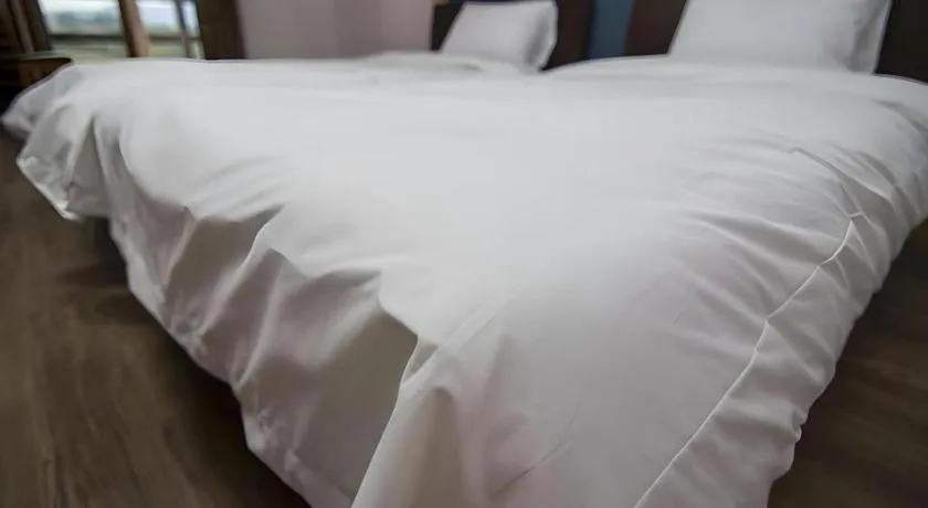Bed in Hyundai Elliot Hotel and Resort