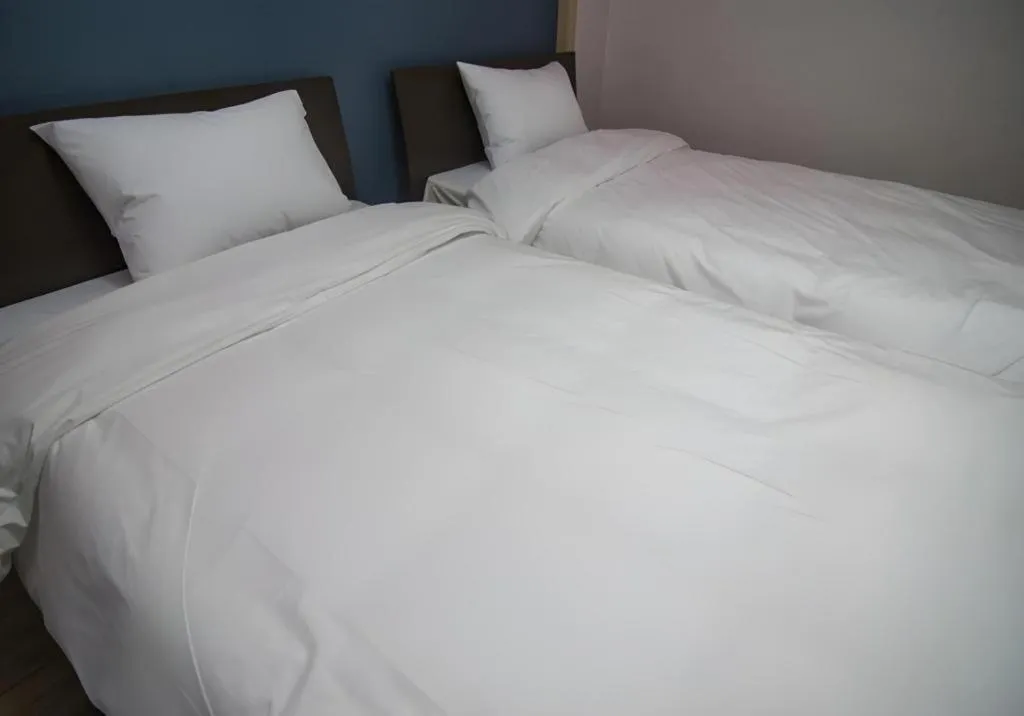 Bed in Hyundai Elliot Hotel and Resort