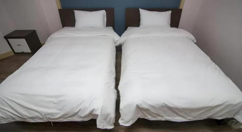 Bed in Hyundai Elliot Hotel and Resort