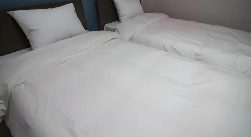 Bed in Hyundai Elliot Hotel and Resort