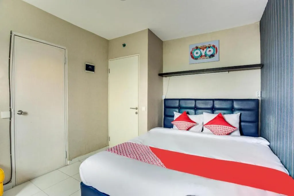 Bed in OYO 3247 Afira Rooms Aeropolis