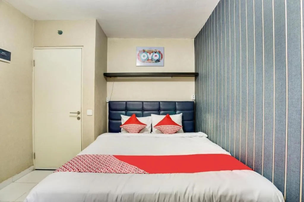 Bed in OYO 3247 Afira Rooms Aeropolis